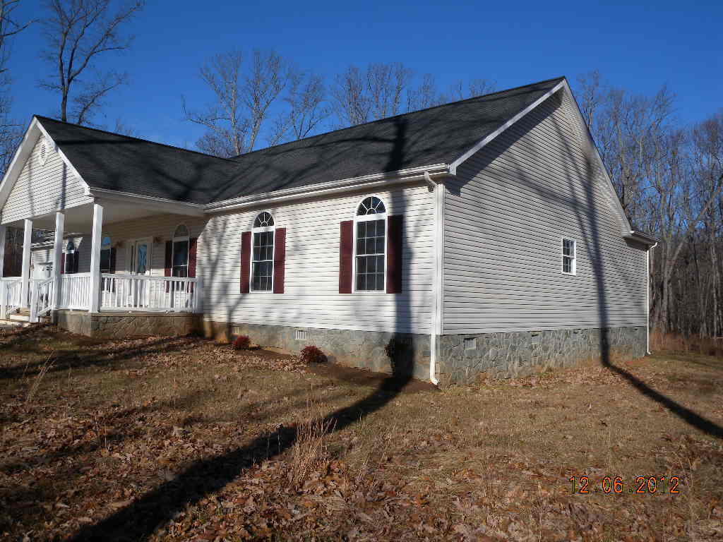 203 Mallard Point Road Wirtz, VA 24184 - Photo 20 of 24 a front view of a house with a yard