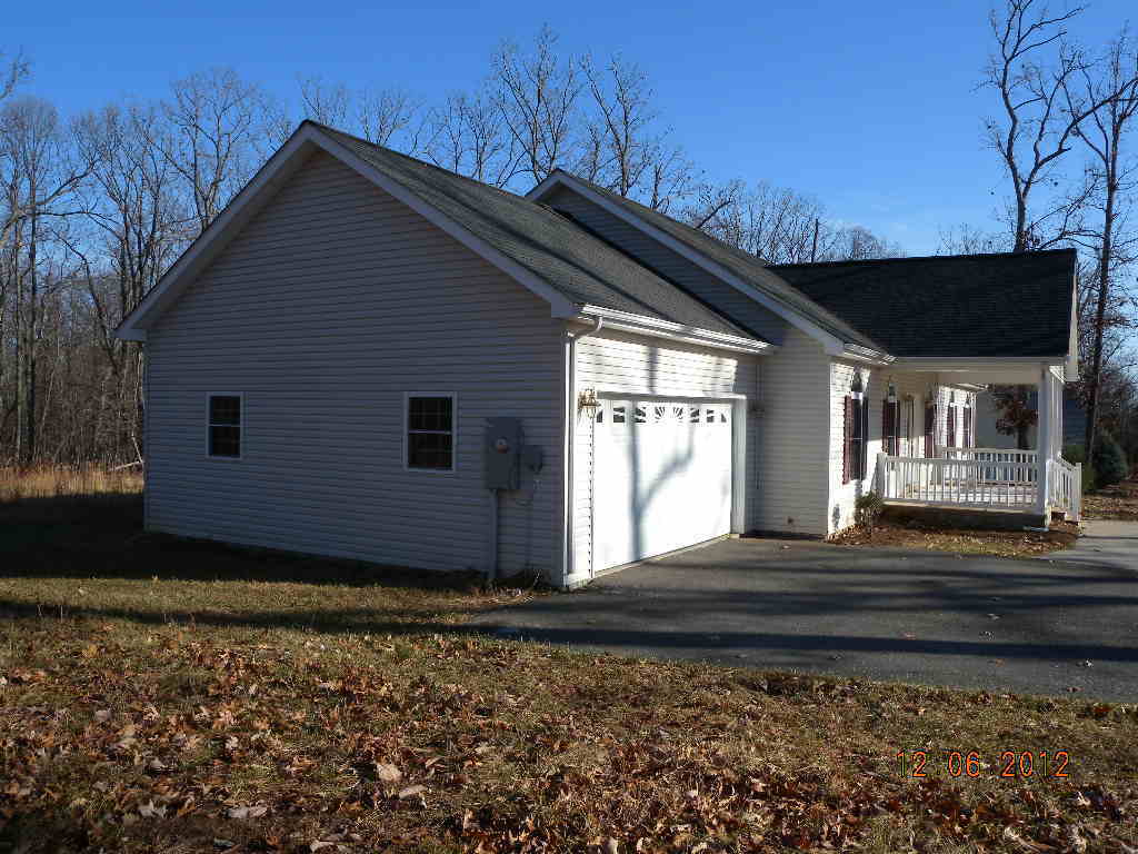 203 Mallard Point Road Wirtz, VA 24184 - Photo 21 of 24 a view of a house with a small yard