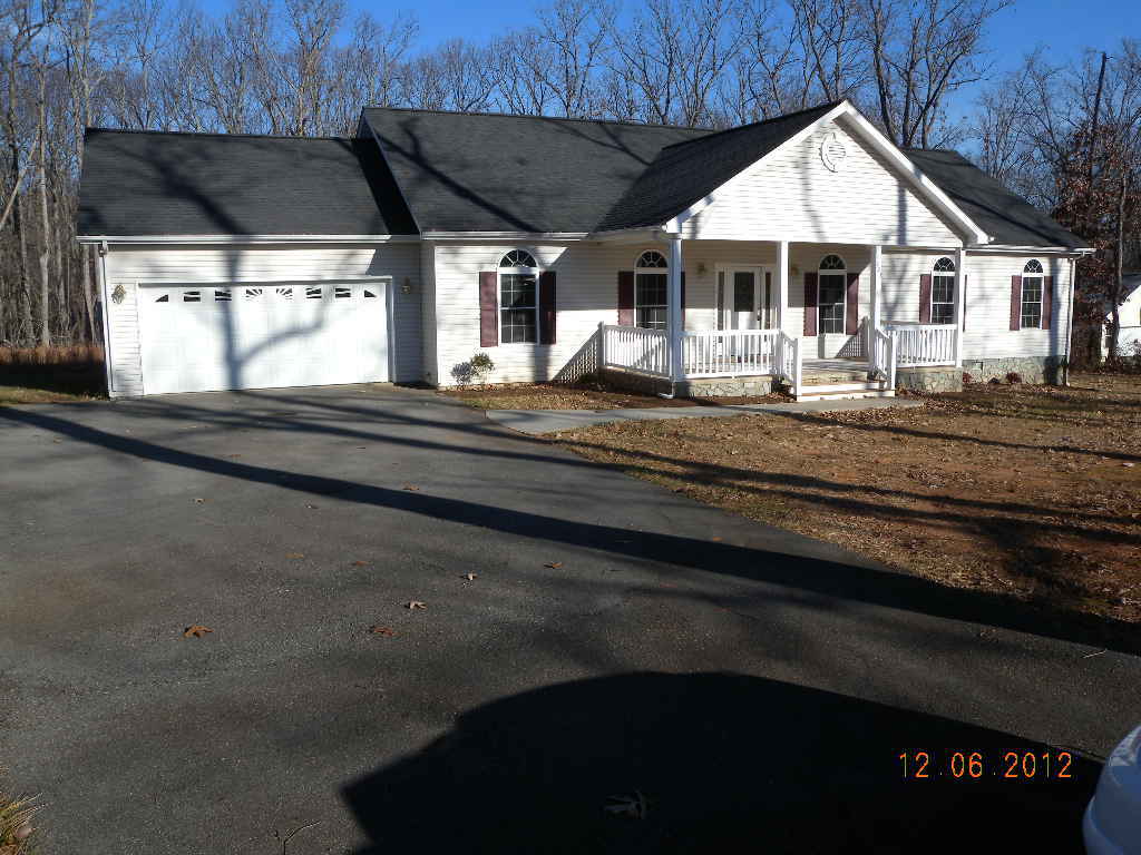 203 Mallard Point Road Wirtz, VA 24184 - Photo 24 of 24 a view of a house with a garage