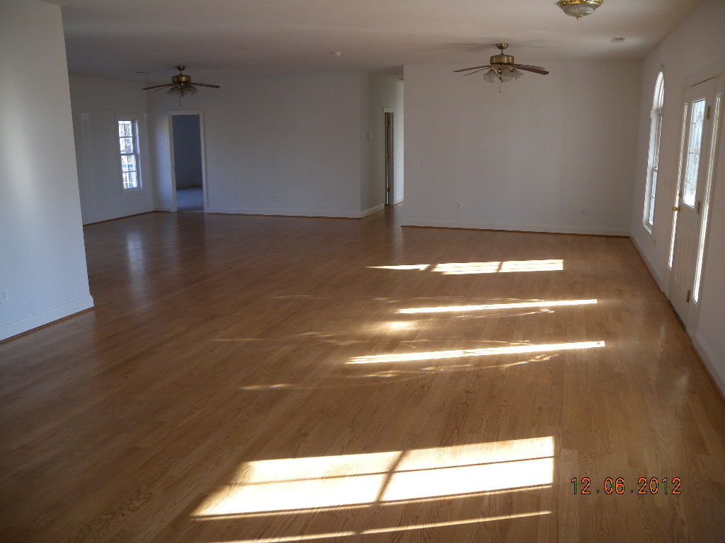 203 Mallard Point Road Wirtz, VA 24184 - Photo 4 of 24 a view of room with window and hardwood floor