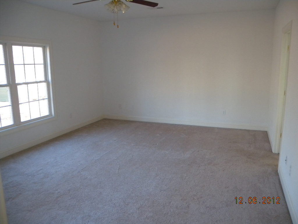 203 Mallard Point Road Wirtz, VA 24184 - Photo 7 of 24 an empty room with a window