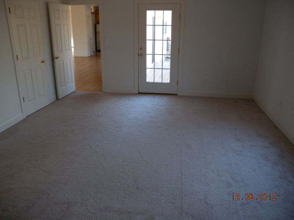 203 Mallard Point Road Wirtz, VA 24184 - Photo 8 of 24 an empty room with windows