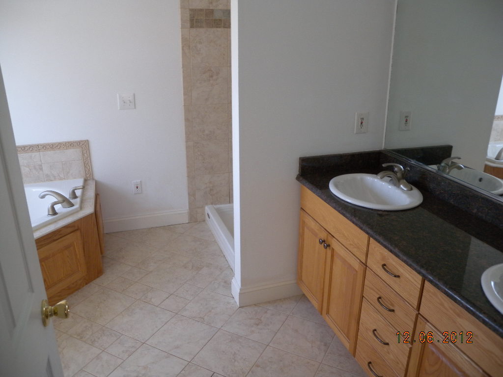 203 Mallard Point Road Wirtz, VA 24184 - Photo 9 of 24 a bathroom with a sink and a mirror