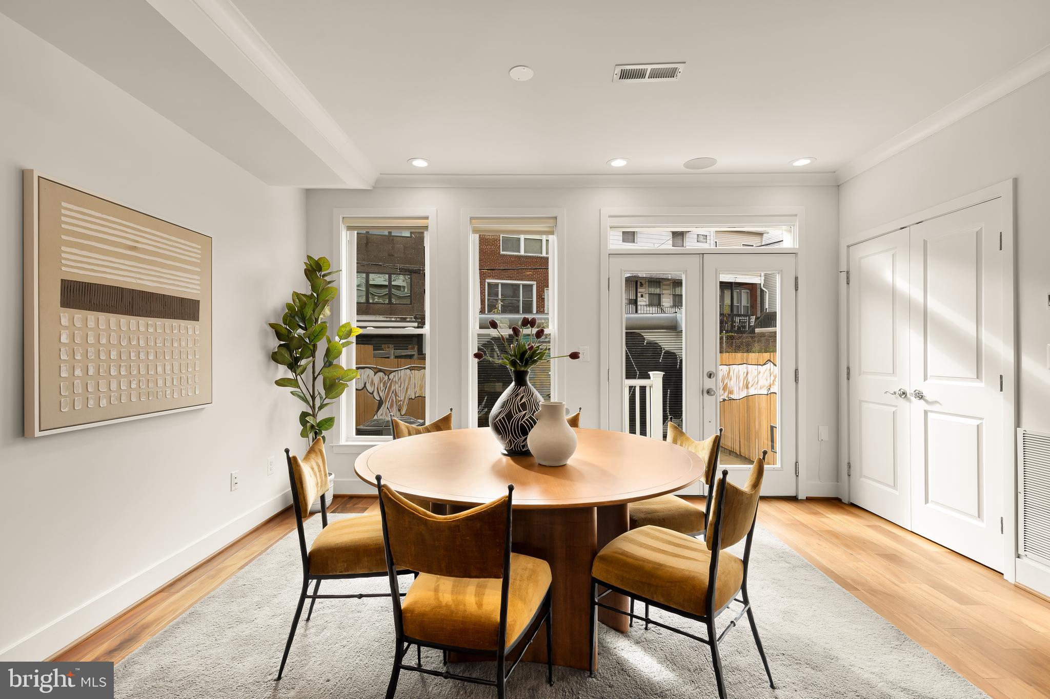1350 Perry Place Northwest Washington, DC 20010 - Photo 13 of 53 a view of a dining room with furniture and window