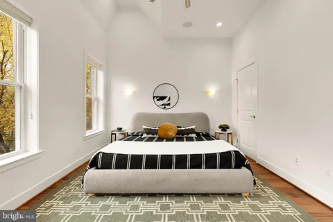 a bedroom with a bed and furniture