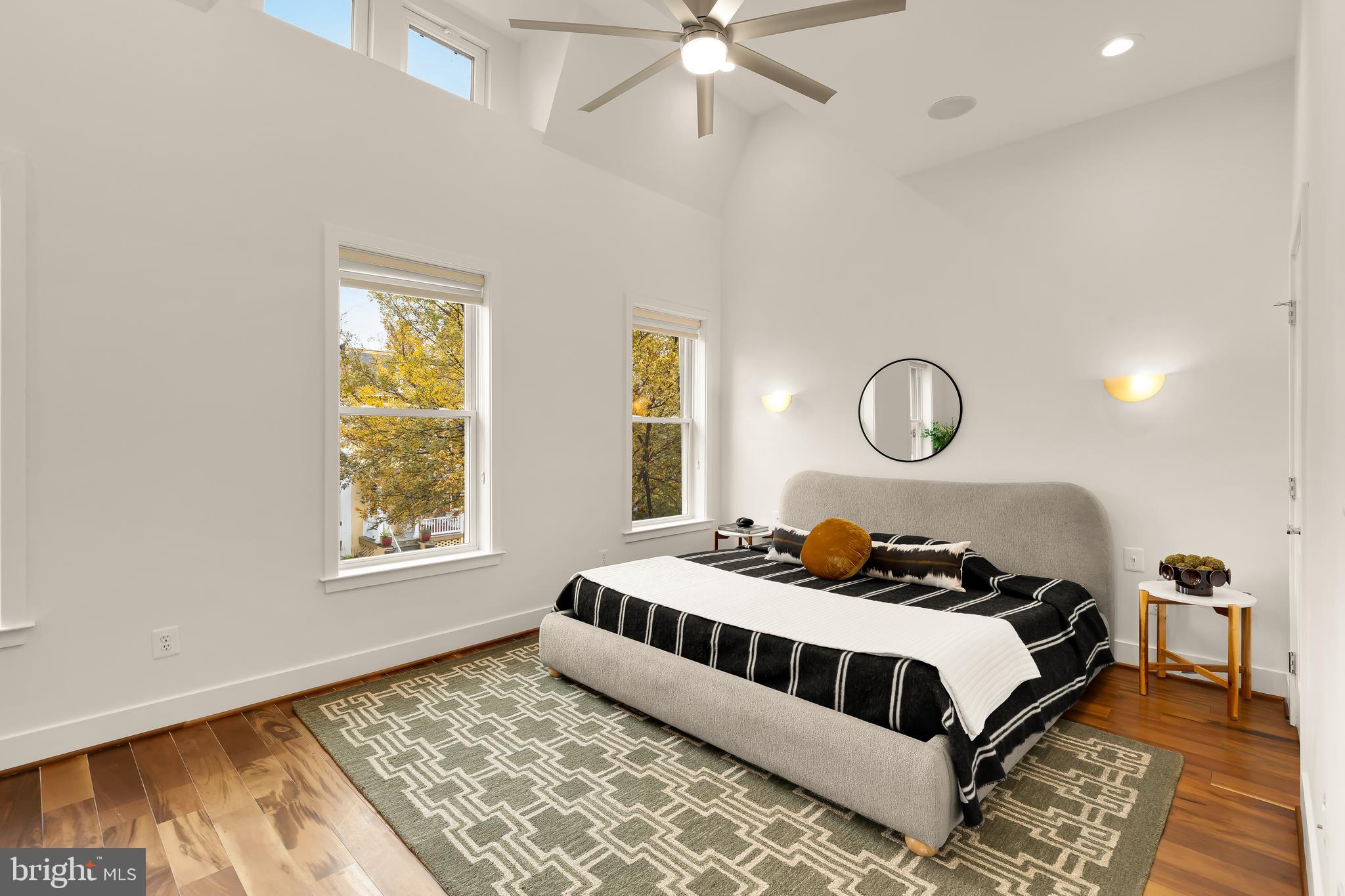 1350 Perry Place Northwest Washington, DC 20010 - Photo 20 of 53 a bedroom with a large bed and a window