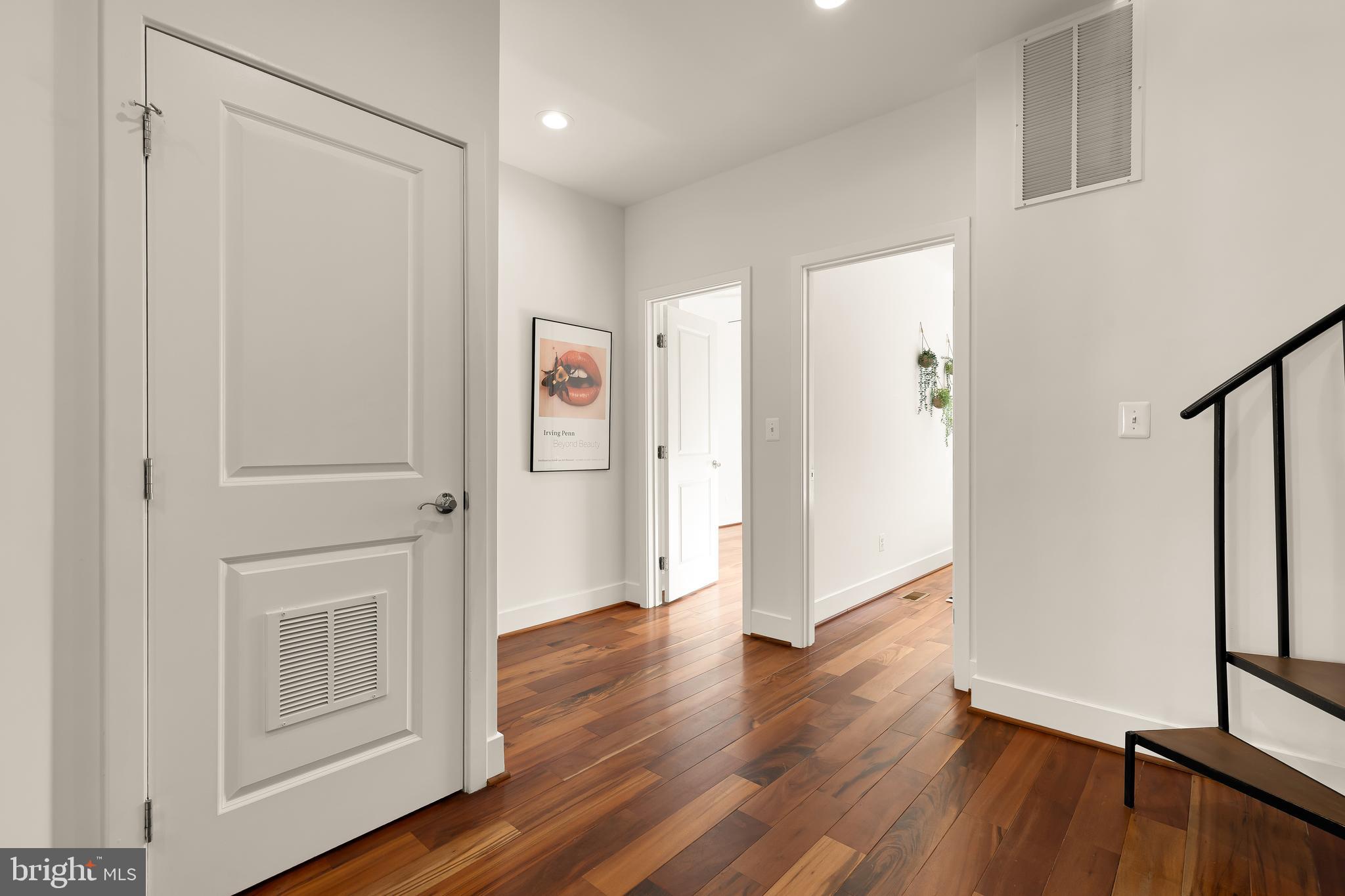 1350 Perry Place Northwest Washington, DC 20010 - Photo 23 of 53 a view of a hallway with wooden floor