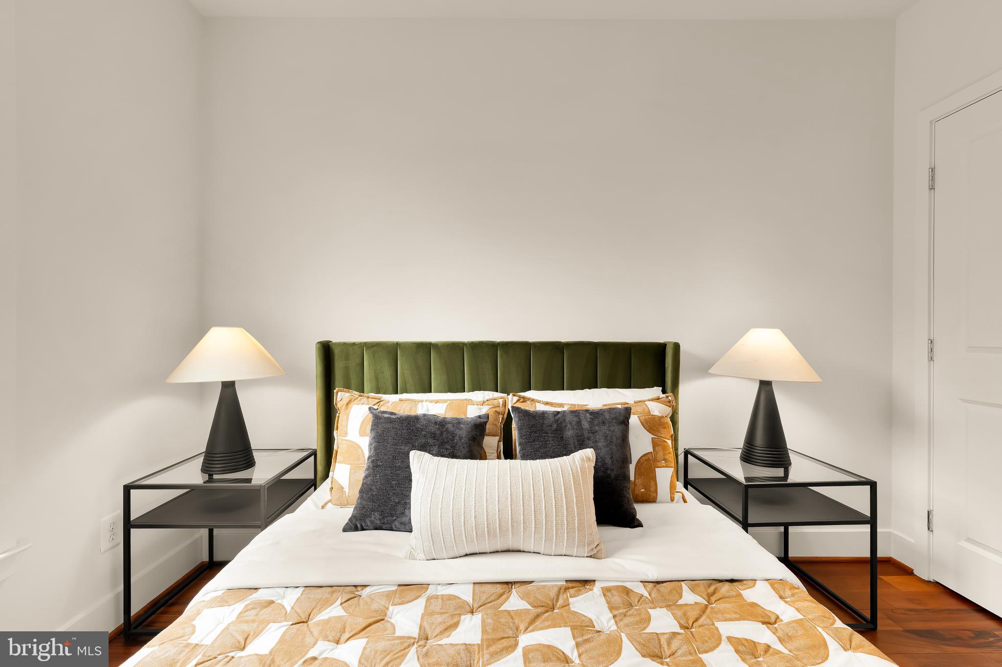 1350 Perry Place Northwest Washington, DC 20010 - Photo 25 of 53 a bedroom with a bed and a lamp