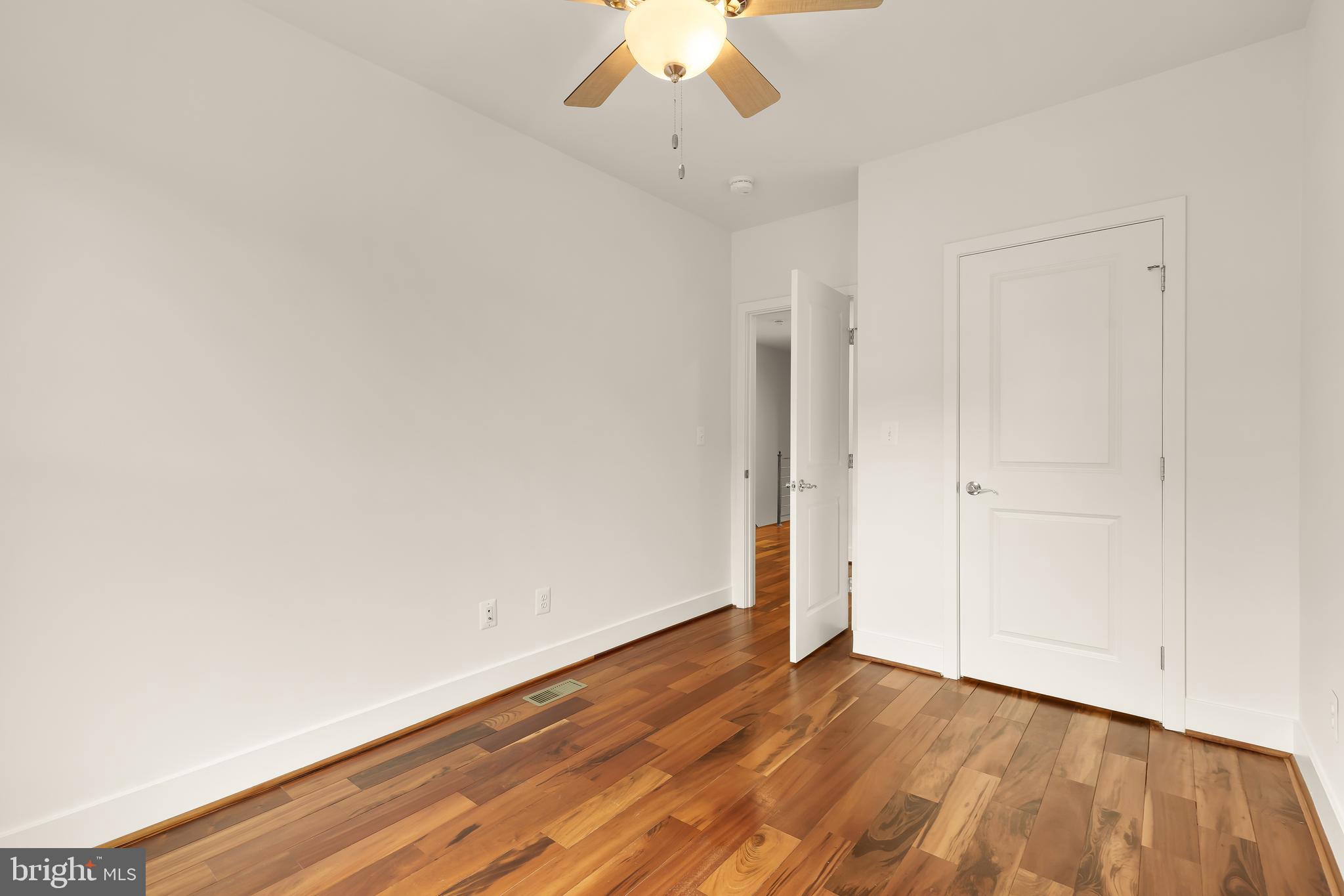 1350 Perry Place Northwest Washington, DC 20010 - Photo 28 of 53 wooden floor in an empty room