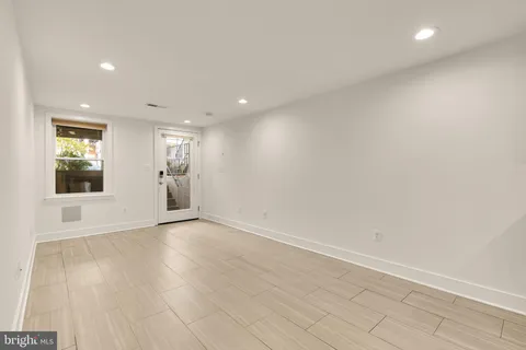 a view of kitchen with wooden floor