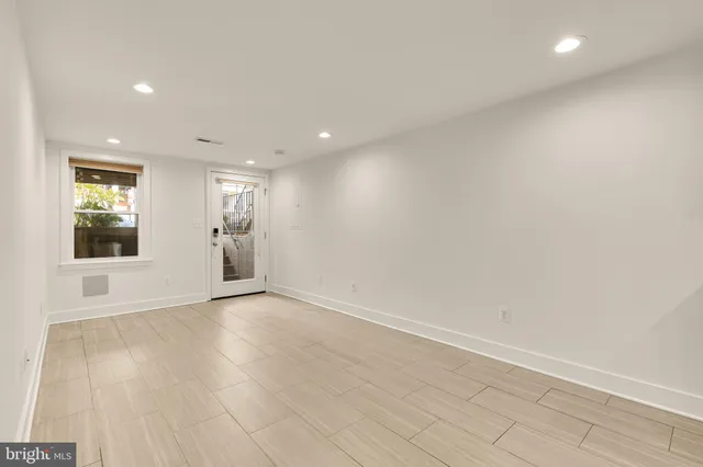 a view of kitchen with wooden floor