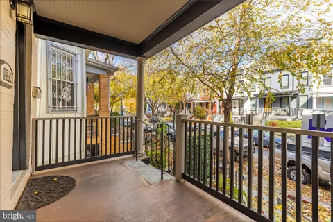 a view of a building from a balcony