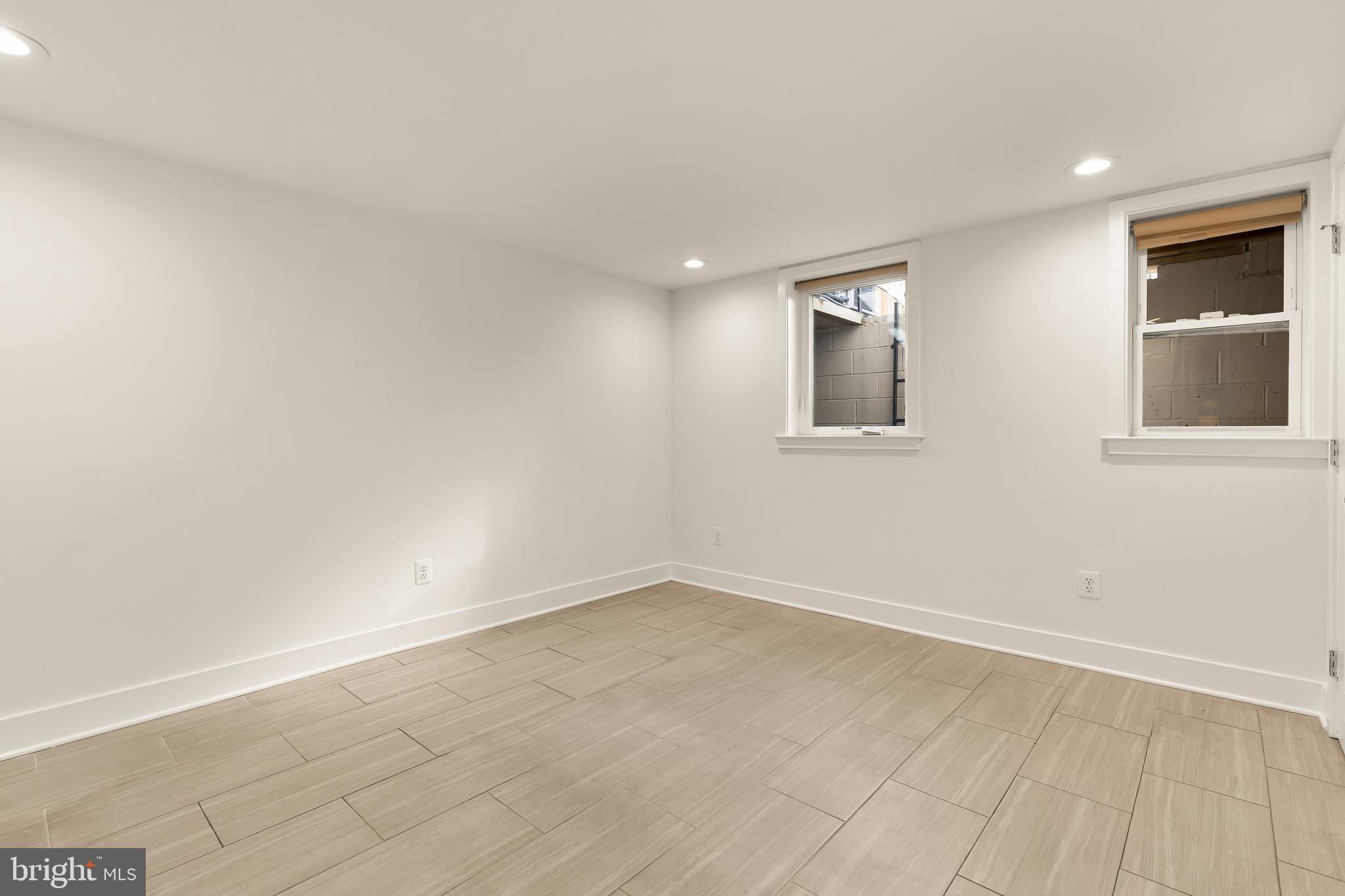 1350 Perry Place Northwest Washington, DC 20010 - Photo 45 of 53 an empty room with windows and closet
