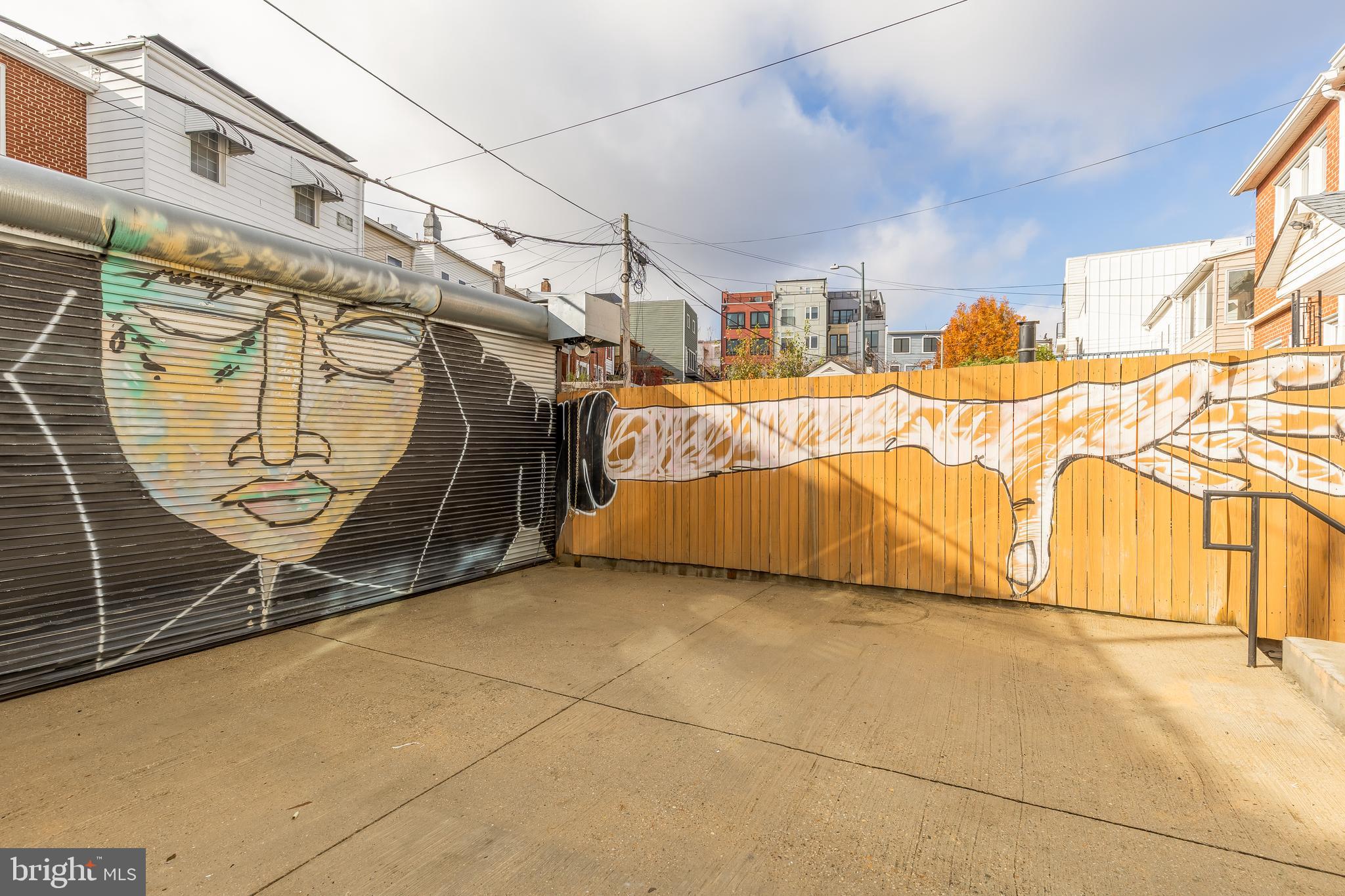 1350 Perry Place Northwest Washington, DC 20010 - Photo 50 of 53 a view of a room with racks on the wall