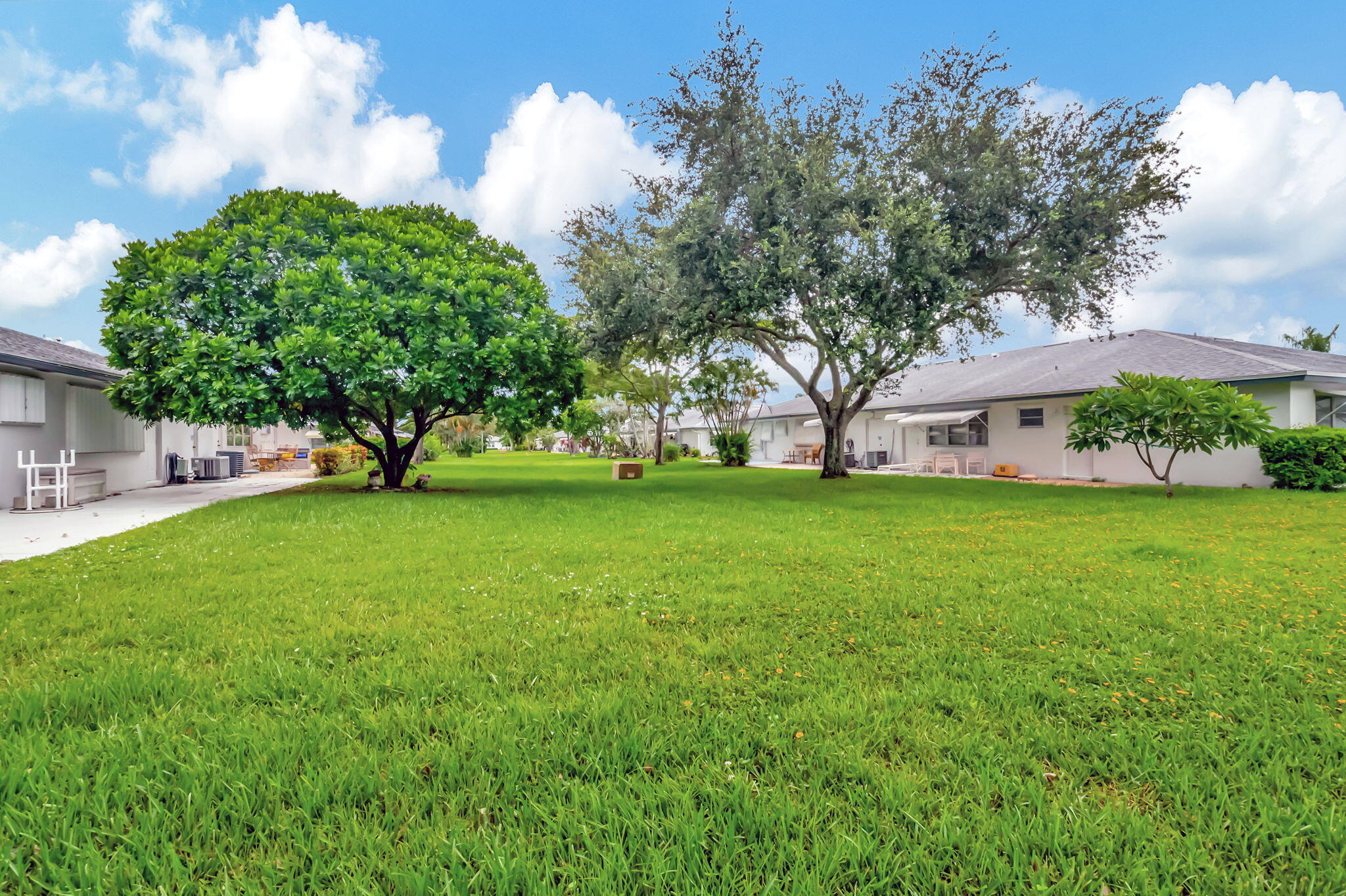1217 South Drive Way, Unit A Delray Beach, FL 33445 - Photo 26 of 27 a view of a park with large trees
