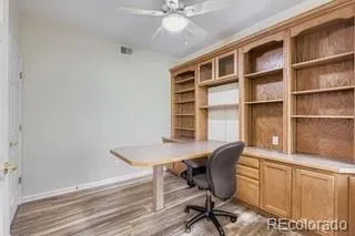 a view of a workspace with furniture