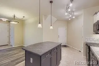 a view of a kitchen and a sink