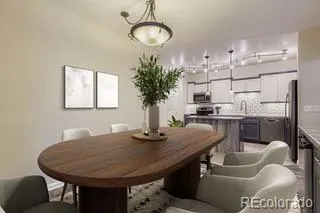 a dining room with kitchen island furniture a chandelier and kitchen view