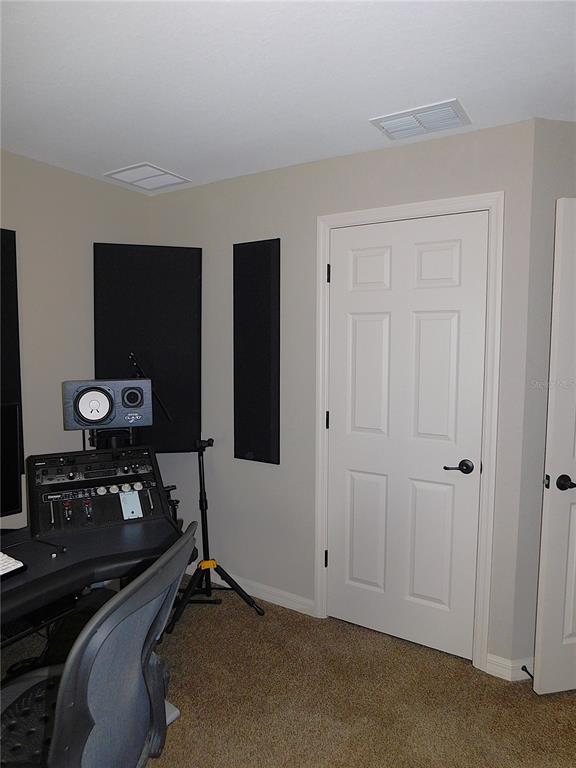 17477 Southwest 36th Terrace Ocala, FL 34473 - Photo 30 of 47 a view of a room with gym equipment