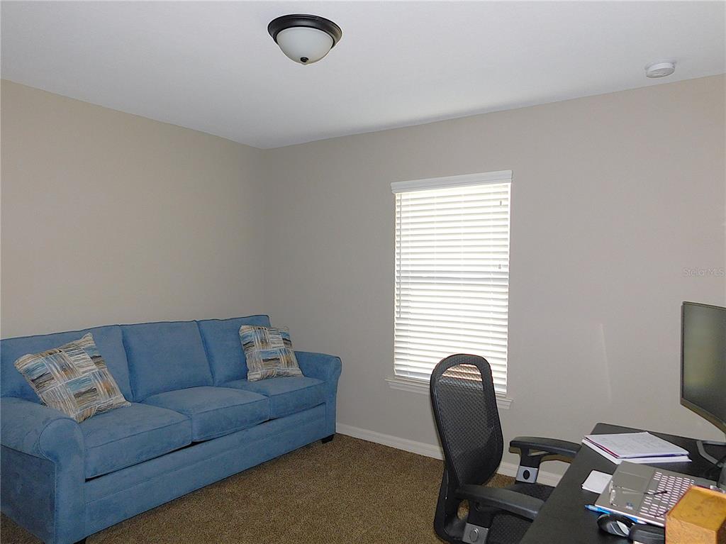 17477 Southwest 36th Terrace Ocala, FL 34473 - Photo 33 of 47 a work room with furniture and a window