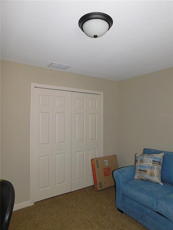 17477 Southwest 36th Terrace Ocala, FL 34473 - Photo 34 of 47 a living room with furniture