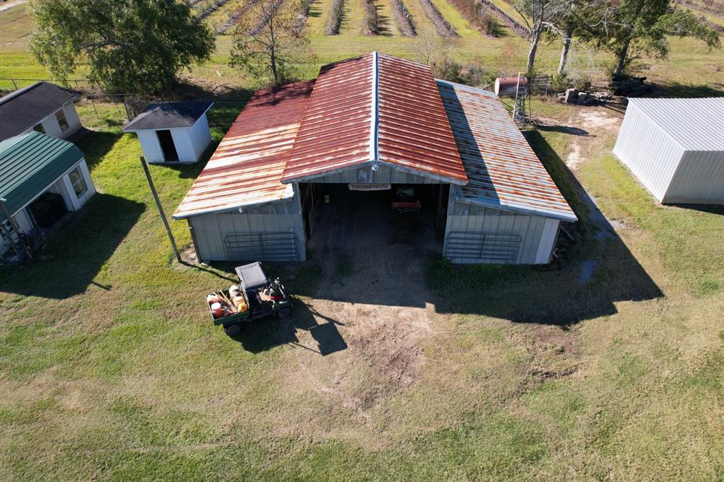 6934 Biscamp Road Silsbee, TX 77656 - Photo 16 of 38 a front view of a house with a yard