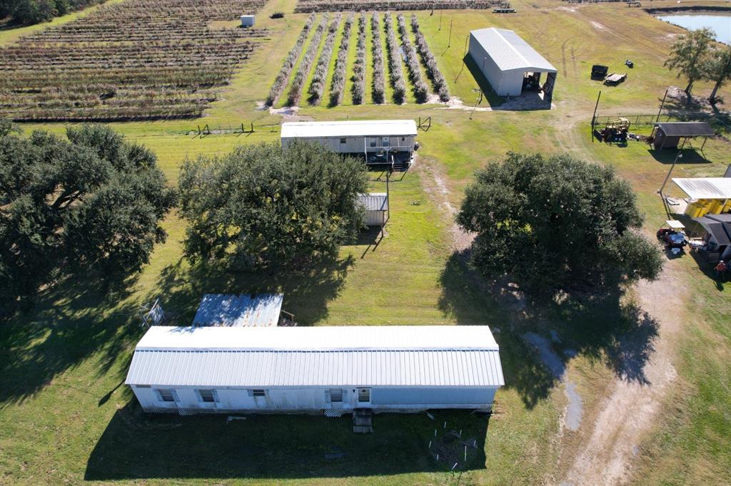 6934 Biscamp Road Silsbee, TX 77656 - Photo 29 of 38 a view of swimming pool with a yard and seating area
