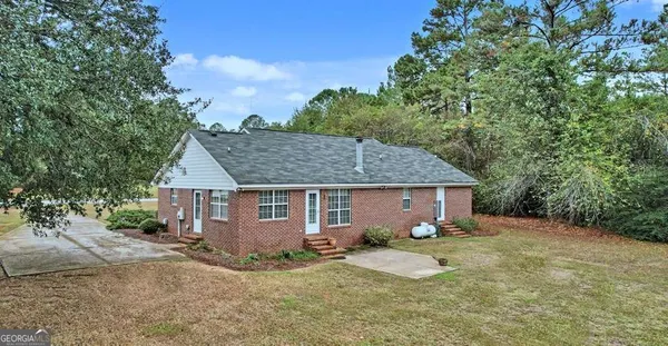 a view of a house with a patio