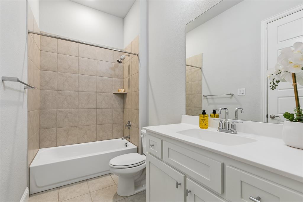 11609 Rust Falls Road Flower Mound, TX 76226 - Photo 5 of 39 En suite bathroom for secondary bedroom on first floor
