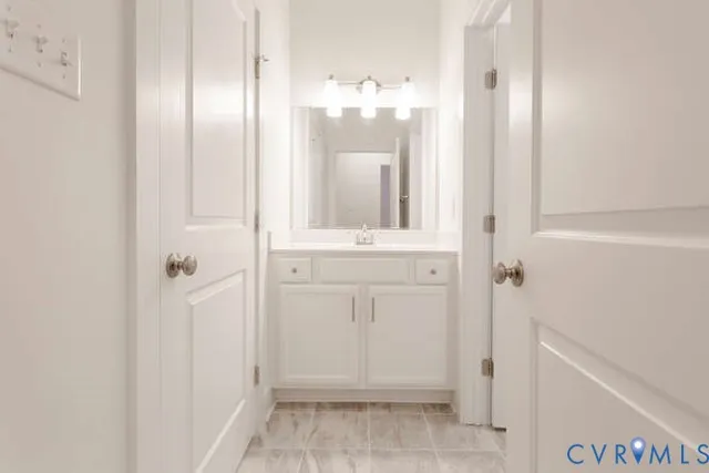 a bathroom with a mirror