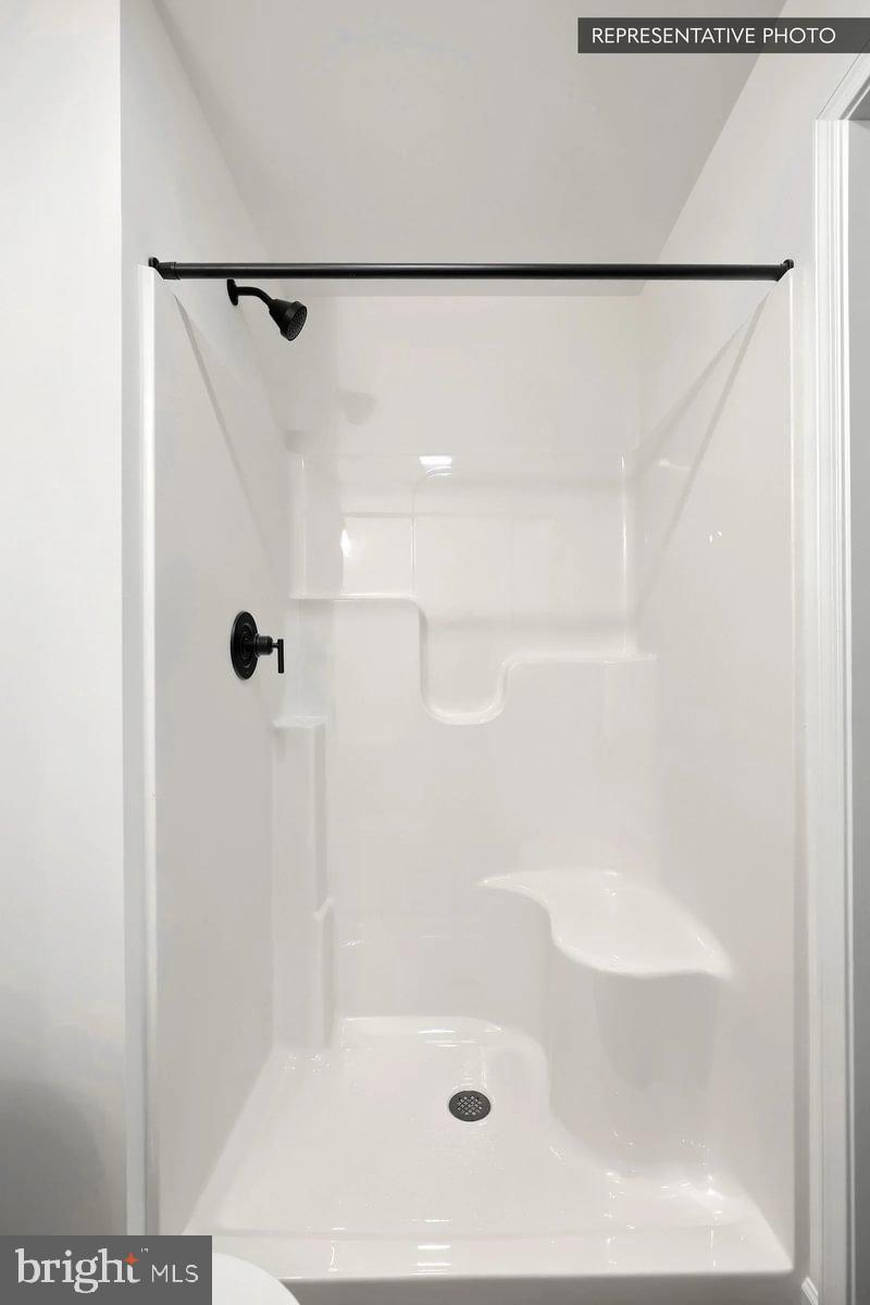 Pin Oak Plan At The Seasons Dover, PA 17315 - Photo 14 of 14 a bathroom with a shower