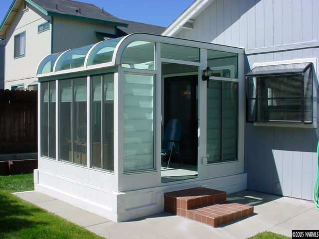 5950 Bankside Way Reno, NV 89523 - Photo 4 of 6 a view of house with front door and porch