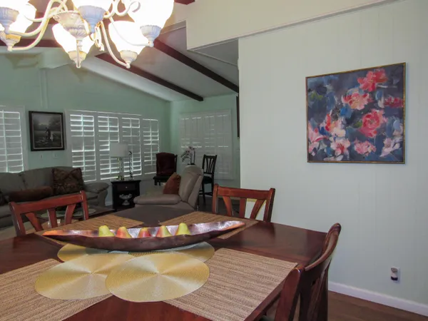 a view of a dining room with furniture