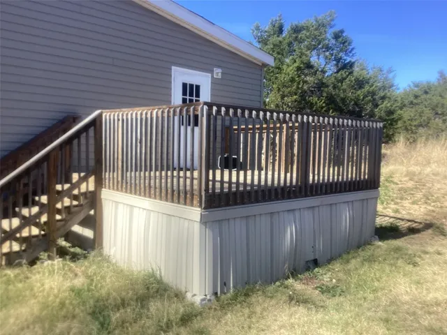 a view of a wooden fence