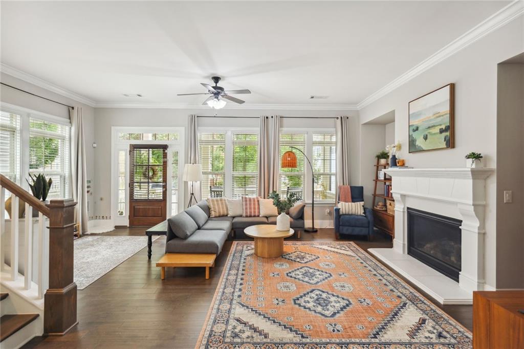 1007 Edgemont Drive Alpharetta, GA 30009 - Photo 1 of 1 a living room with furniture and a fireplace