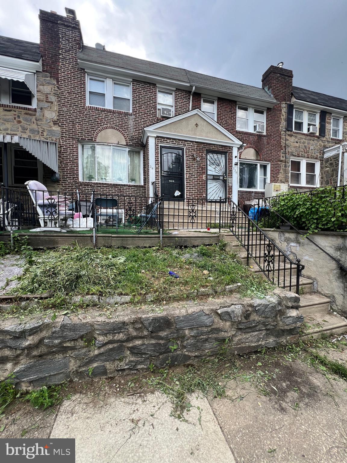 241 Margate Road Upper Darby, PA 19082 - Photo 1 of 6 a front view of a residential apartment building with a yard