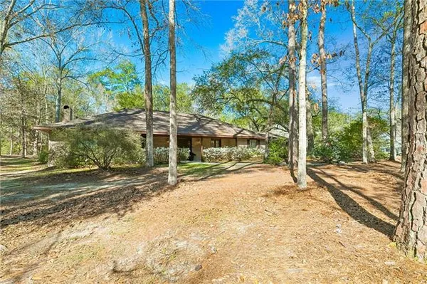 $575,000 | 599 Dove Park Road, Covington, LA 70433