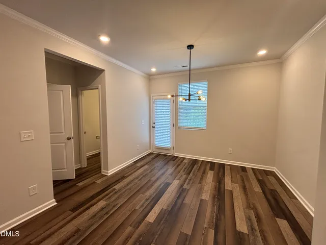 a view of balcony with wooden floor and fence