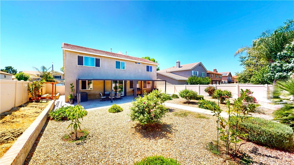 1279 Longbranch Road San Jacinto, CA 92582 - Photo 11 of 35 a view of a house with a yard