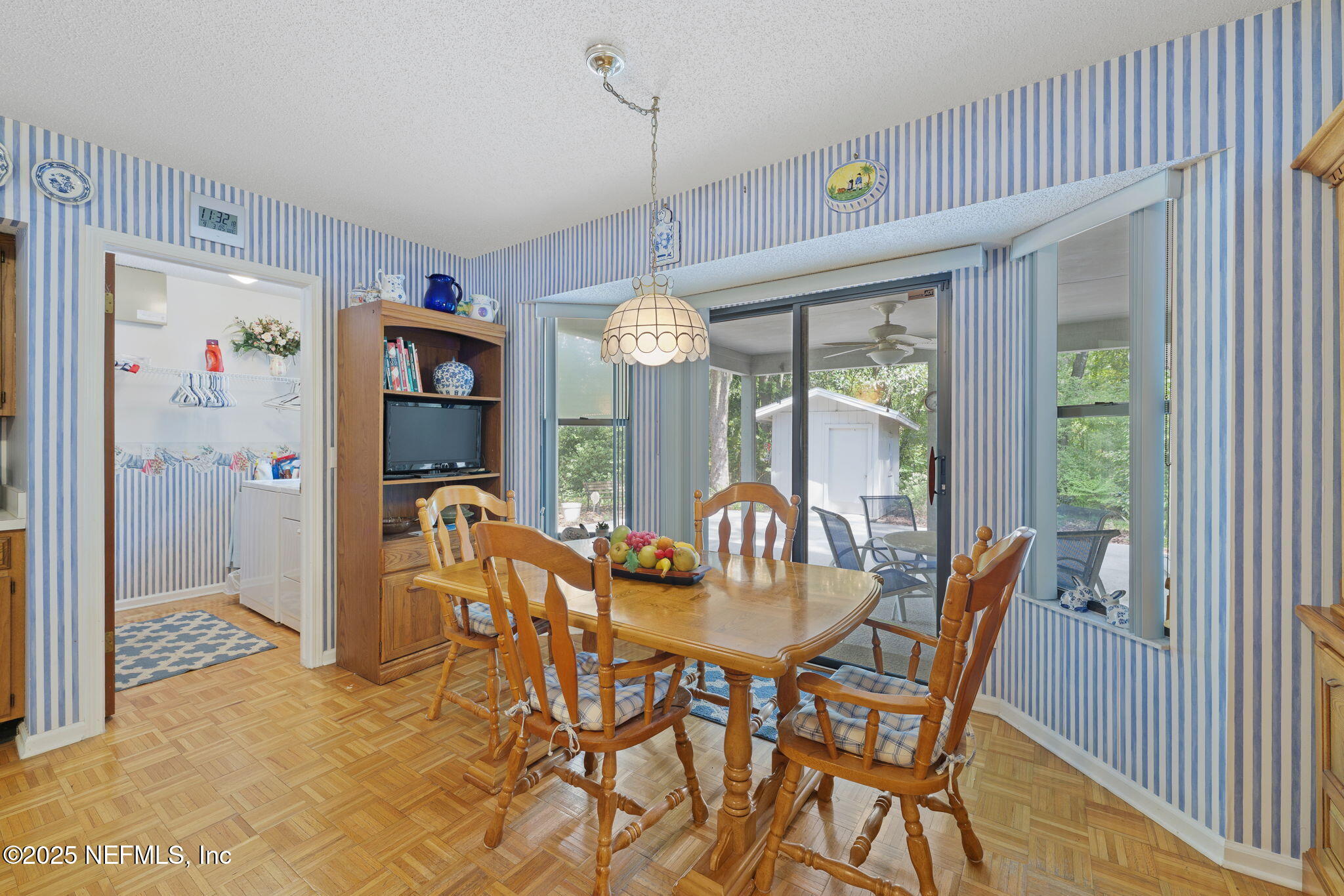 3007 Holly Road Orange Park, FL 32065 - Photo 12 of 44 a view of a dining room with furniture window and outside view