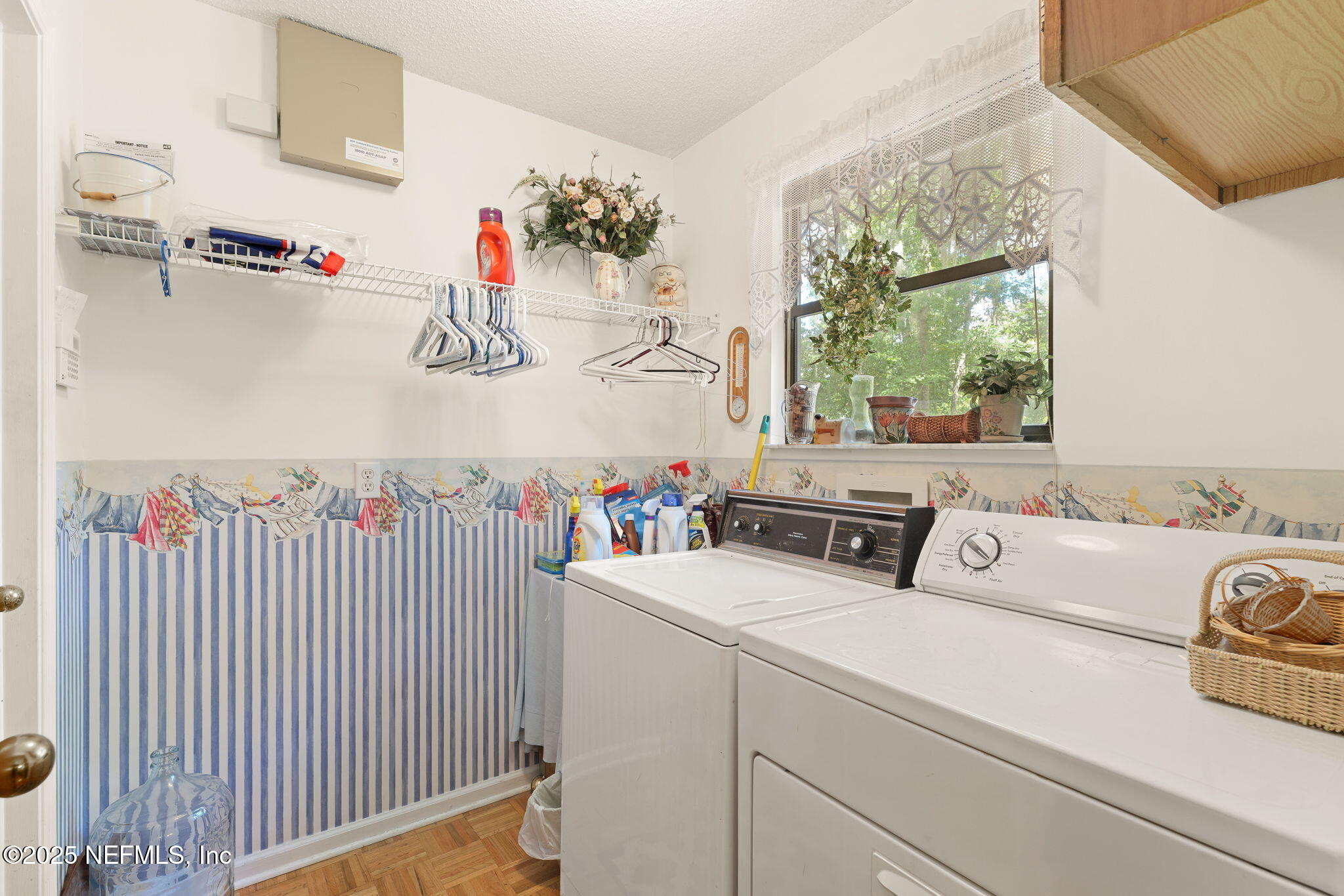3007 Holly Road Orange Park, FL 32065 - Photo 13 of 44 a utility room with dryer and washer