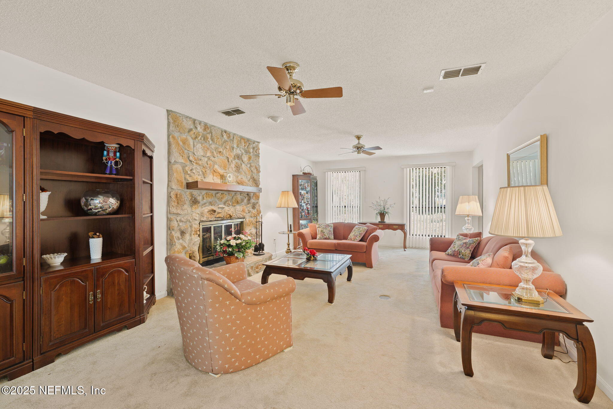 3007 Holly Road Orange Park, FL 32065 - Photo 15 of 44 a living room with furniture and a flat screen tv