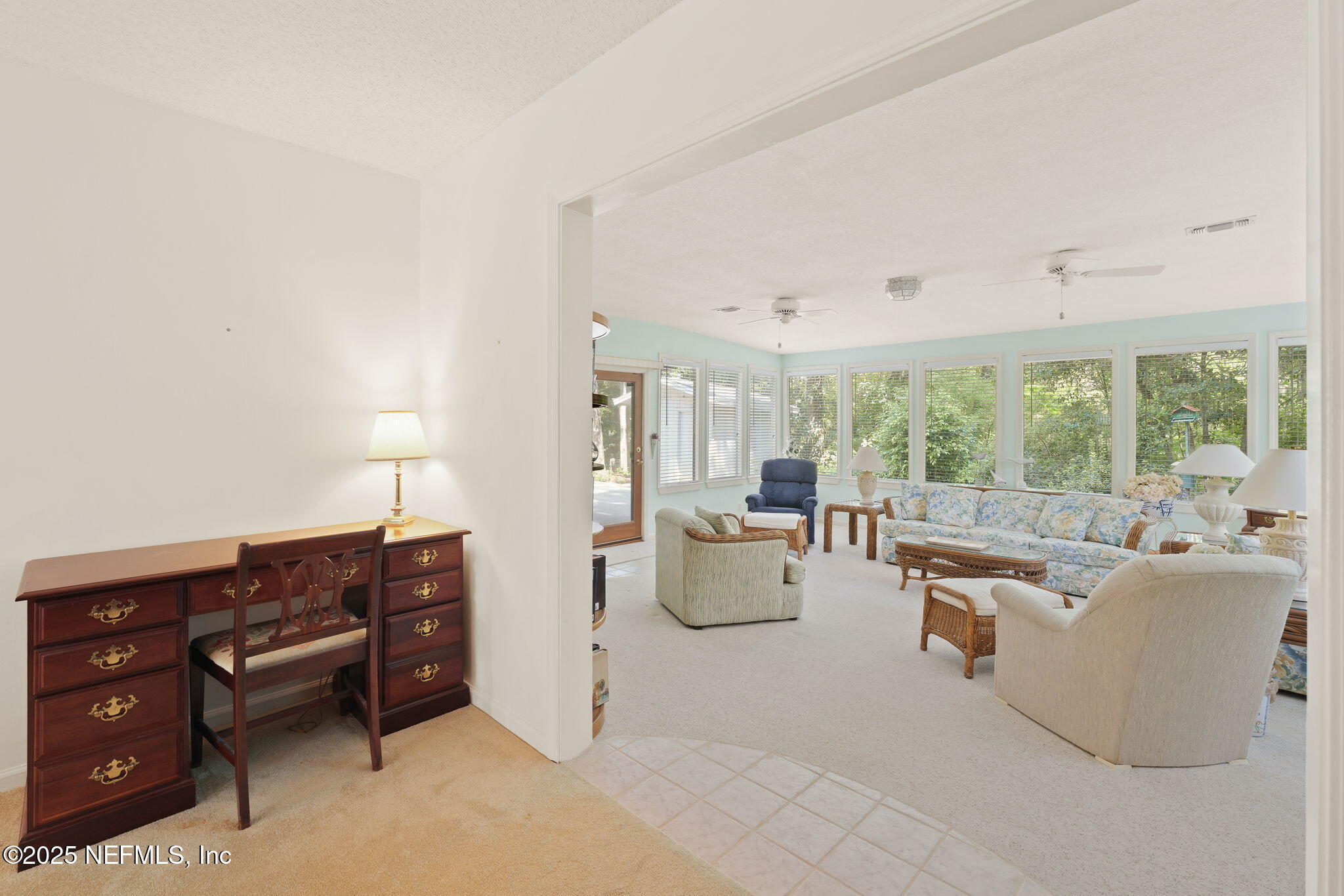 3007 Holly Road Orange Park, FL 32065 - Photo 18 of 44 a living room with furniture and a large window