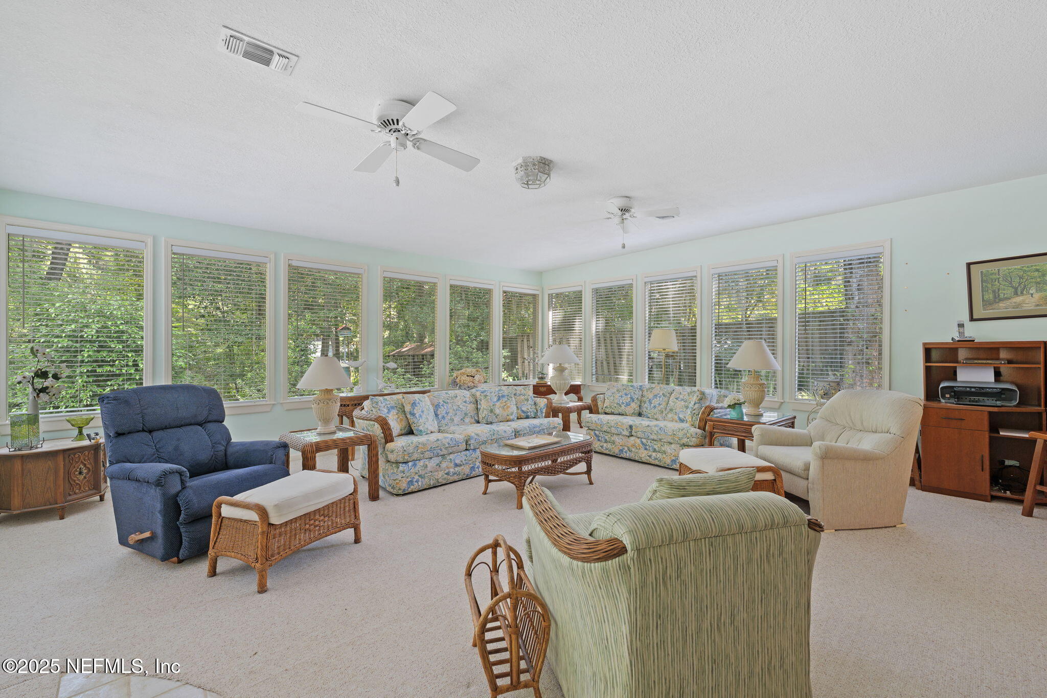 3007 Holly Road Orange Park, FL 32065 - Photo 20 of 44 a living room with furniture and a large window