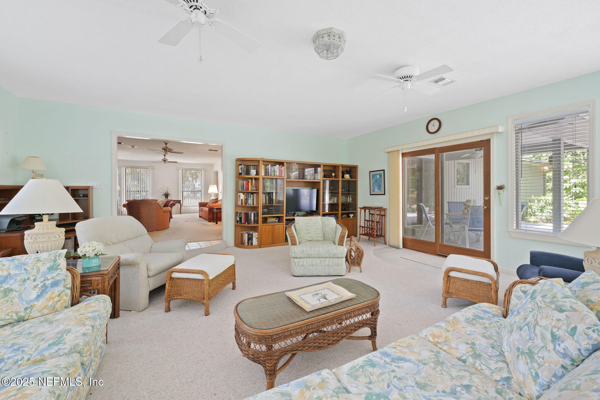 3007 Holly Road Orange Park, FL 32065 - Photo 21 of 44 a living room with furniture and a large window
