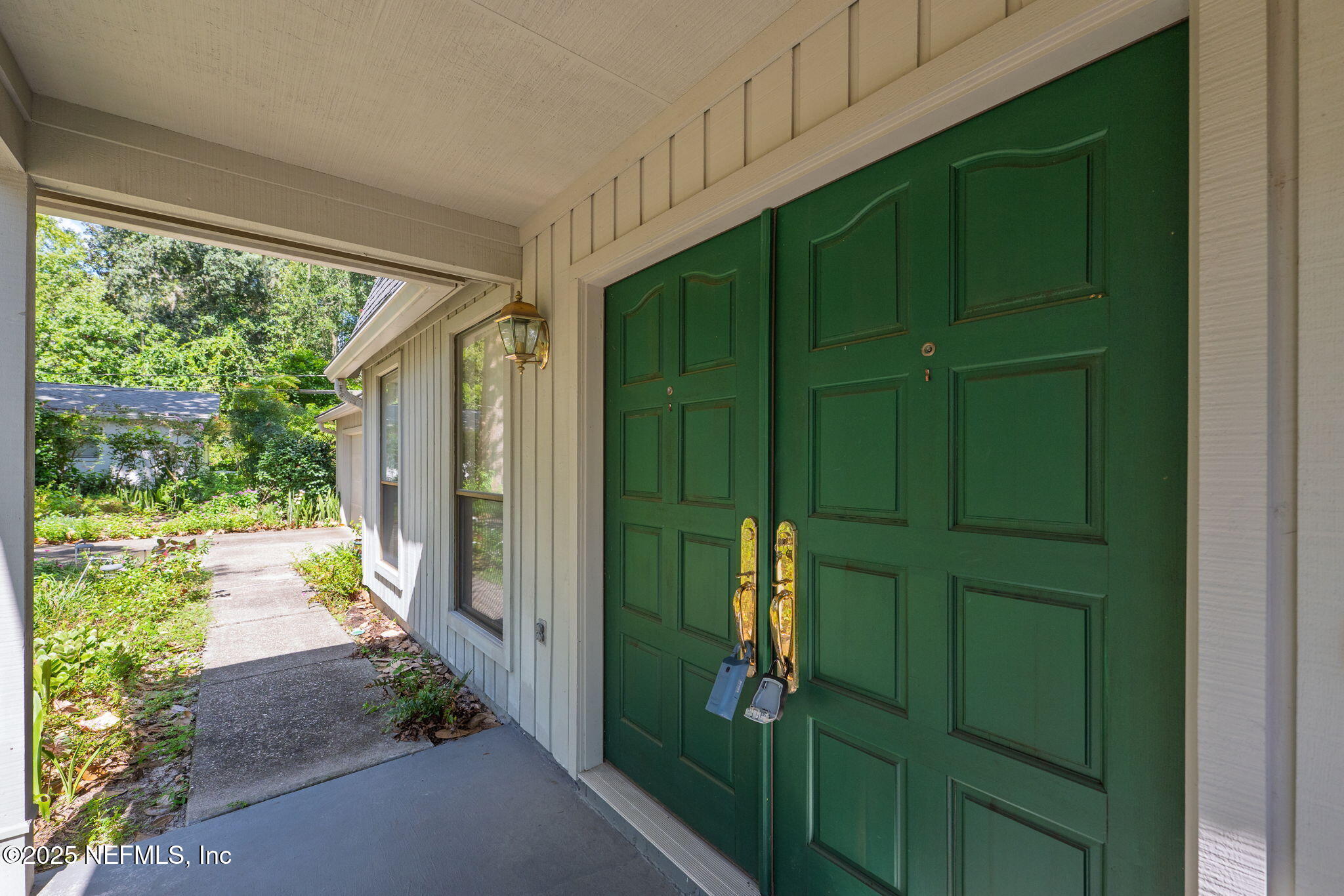 3007 Holly Road Orange Park, FL 32065 - Photo 3 of 44 a view of a door and wooden fence