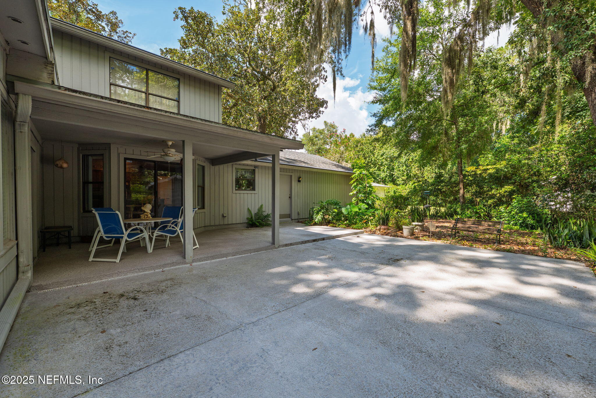3007 Holly Road Orange Park, FL 32065 - Photo 35 of 44 a view of a house with backyard porch and sitting area