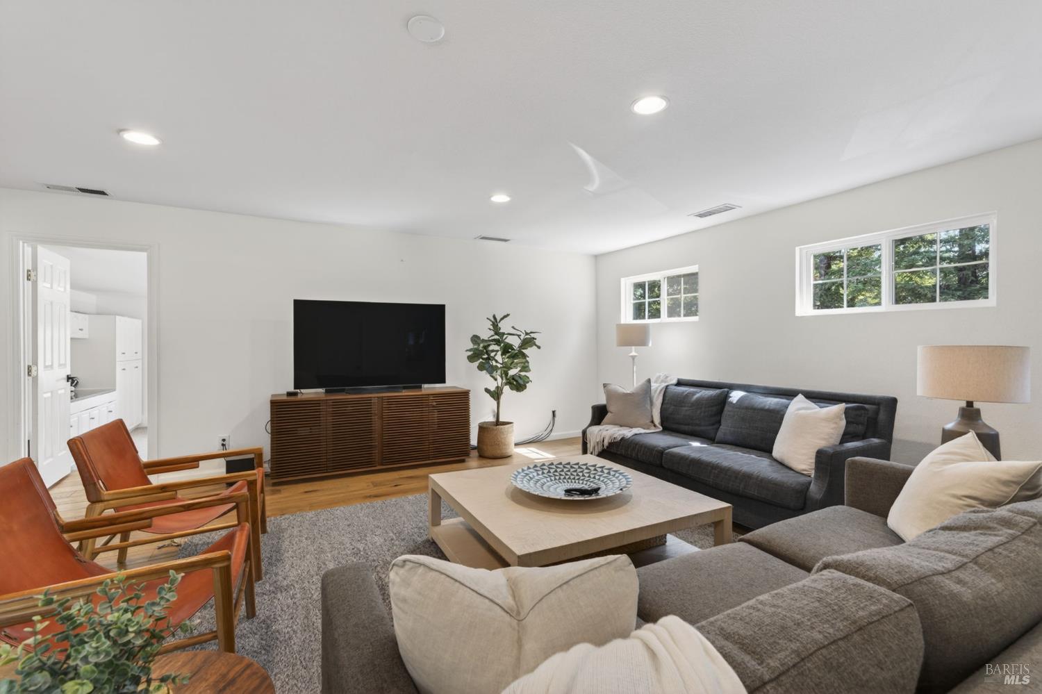 1541 Chablis Road Healdsburg, CA 95448 - Photo 16 of 68 a living room with furniture and a flat screen tv