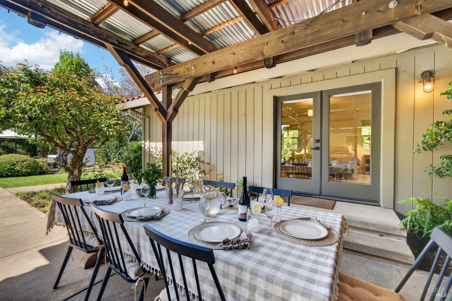1541 Chablis Road Healdsburg, CA 95448 - Photo 43 of 68 a view of a patio with chairs and table in patio