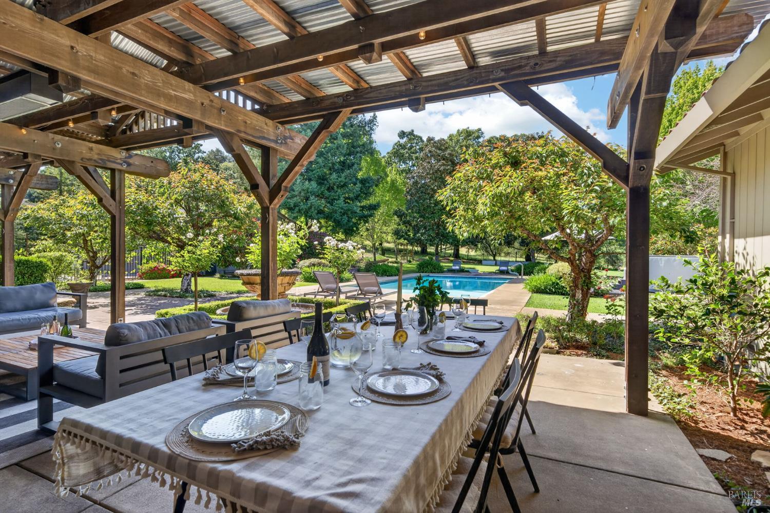 1541 Chablis Road Healdsburg, CA 95448 - Photo 53 of 68 a dining space with furniture and garden view